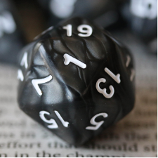 image of black twenty sided dice meant to play dungeons and dragons.